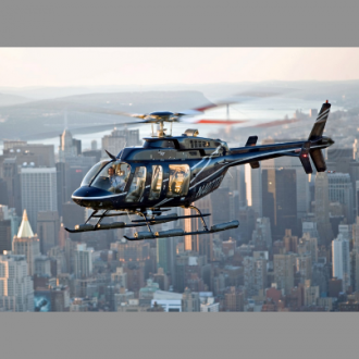 Вертолёт Bell 407 Вертолет Bell 407 прекрасно подходит для трансфера на несколько сотен километров – роскошный VIP-салон располагает к комфортному отдыху, а из широких окон открывается великолепный обзор. В таком вертолете можно летать семьей или небольшой компанией до 6 человек. При этом более комфортное размещение предусмотрено при опущенной в виде подлокотника спинке среднего сидения заднего дивана – в этом случае до 4 VIP пассажиров могут располагаться в 2 ряда лицом к лицу в клубном салоне, а еще один счастливчик может занять место 2-го пилота в кабине слева, либо по Вашему выбору там будет находиться еще один летчик.   Эксклюзивное выпуклое окно двери (до самого пола) у того, кому повезет насладиться полетом в пилотской кабине, в сочетании с большим лобовым стеклом и хорошим окном под ногами дает переднему пассажиру беспрецедентный обзор и полное ощущение самостоятельного полета.